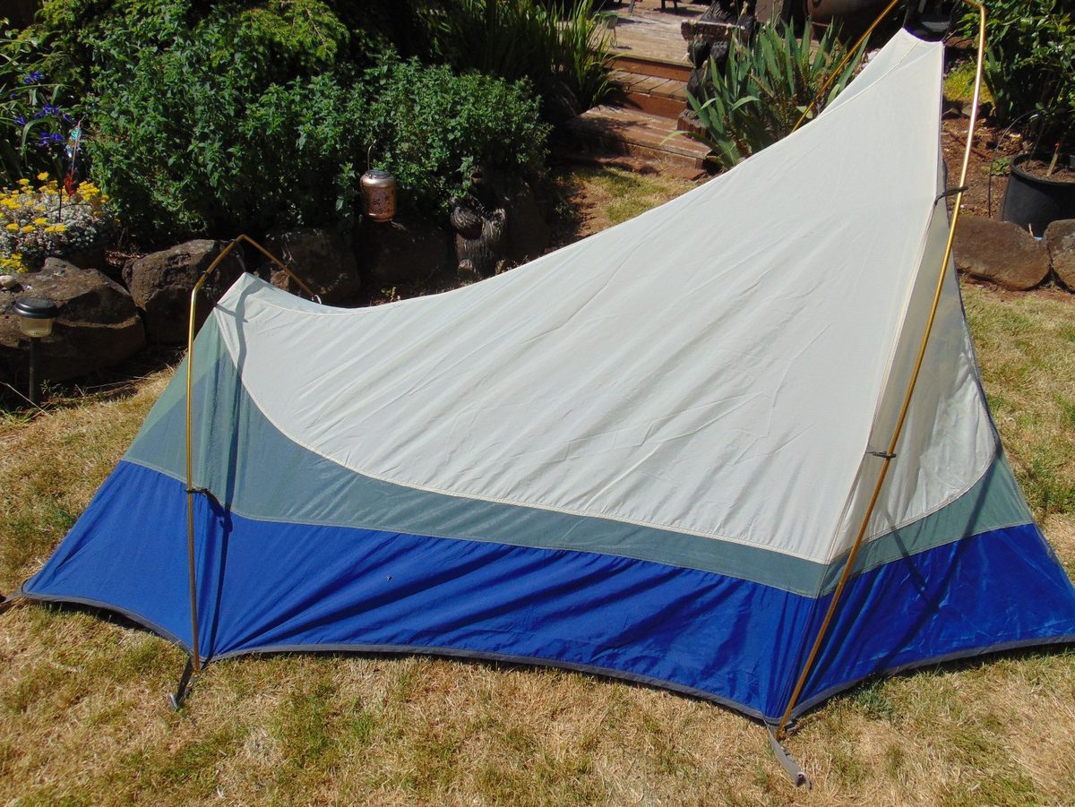 Side profile of the Clip Flashlight CD showing the modified hoop geometry and the black Swift Clips attaching the canopy to the bare aluminum poles